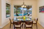 The dining room features great views to the pool area 